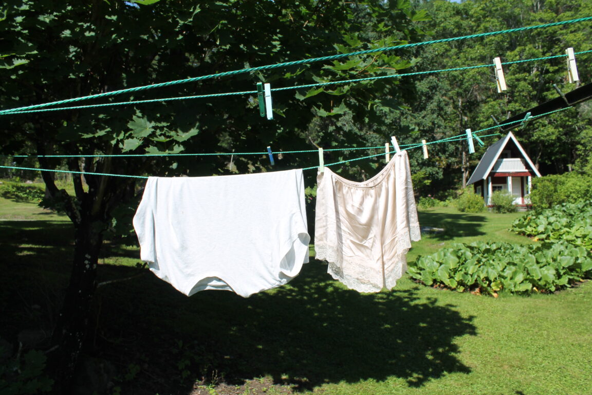 Clothes hanging on a clothesline in the yard