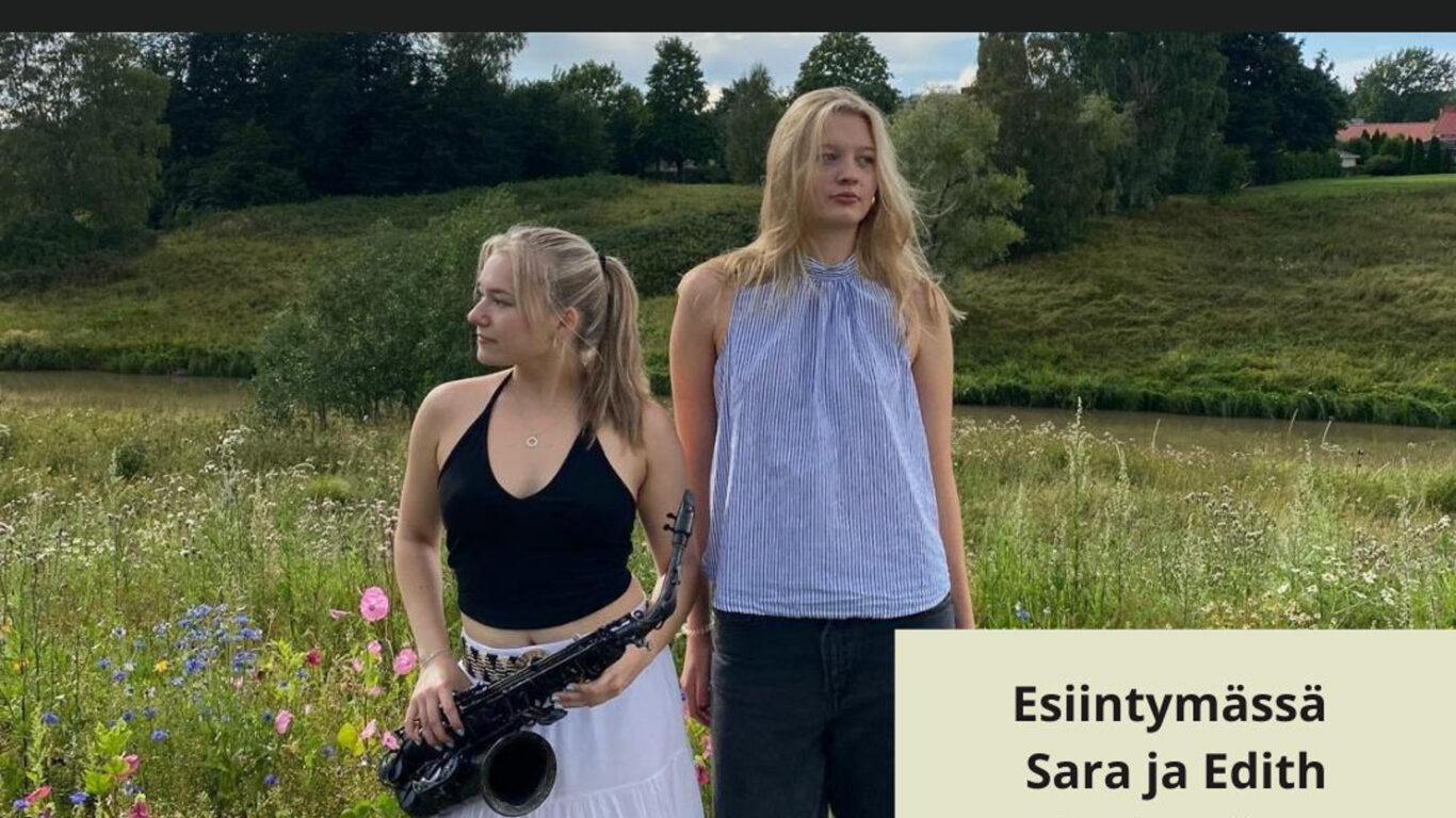 Sara ja Edith kukkaniityllä
